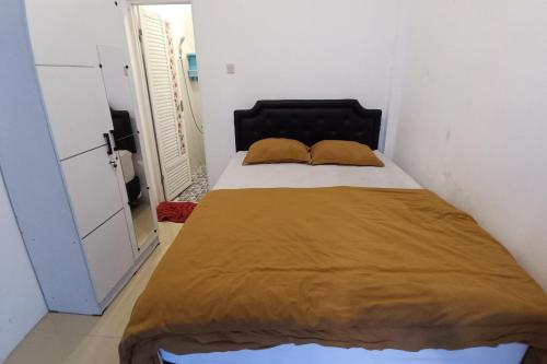 Imagen de la habitación del Hotel OYO 94120 Penginapan Viki Syariah. Foto 20