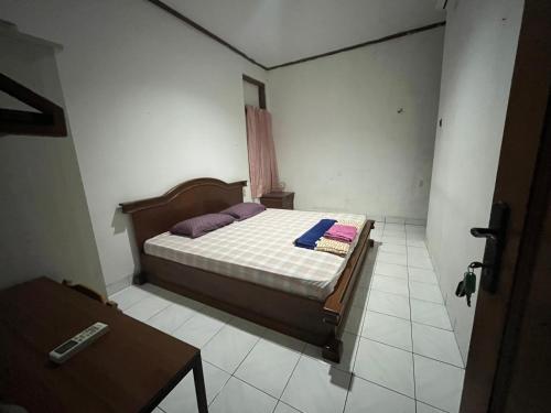 Imagen de la habitación del Hotel OYO 94142 Al Fatih Residence Syariah 2. Foto 19