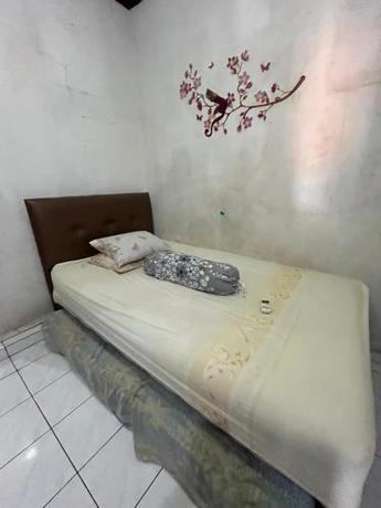 Imagen de la habitación del Hotel OYO 94142 Al Fatih Residence Syariah 2. Foto 20