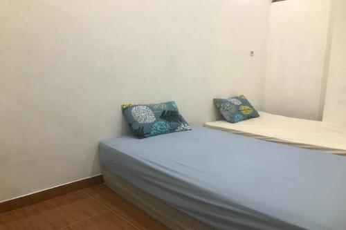Imagen de la habitación del Hotel OYO 94153 Bantul Syariah Homestay. Foto 20