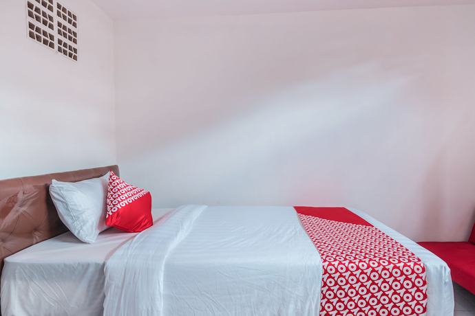 Imagen de la habitación del Hotel OYO 947 Angel Home Stay Syariah. Foto 3