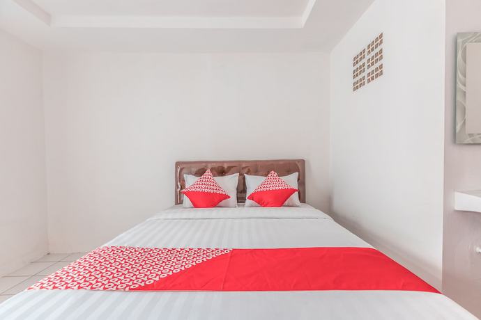 Imagen de la habitación del Hotel OYO 947 Angel Home Stay Syariah. Foto 13