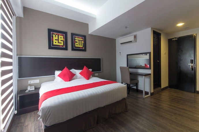 Imagen de la habitación del Hotel OYO 94761 Indah. Foto 8
