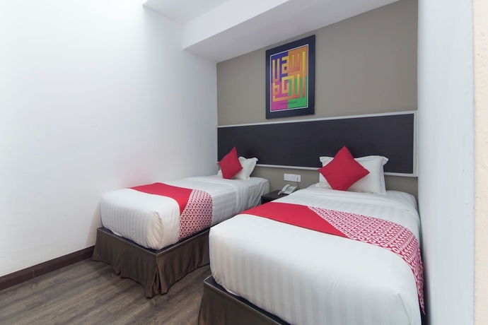 Imagen de la habitación del Hotel OYO 94761 Indah. Foto 9