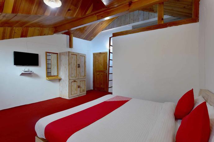 Imagen de la habitación del Hotel OYO 9480 Sun N Snow Resort. Foto 6
