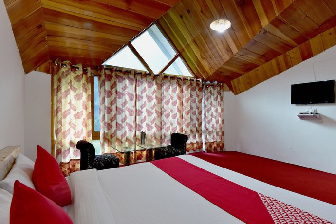 Imagen de la habitación del Hotel OYO 9480 Sun N Snow Resort. Foto 12