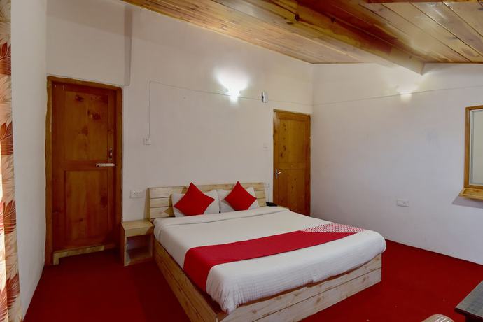 Imagen de la habitación del Hotel OYO 9480 Sun N Snow Resort. Foto 14