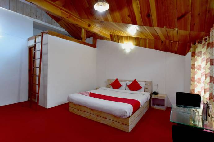 Imagen de la habitación del Hotel OYO 9480 Sun N Snow Resort. Foto 15