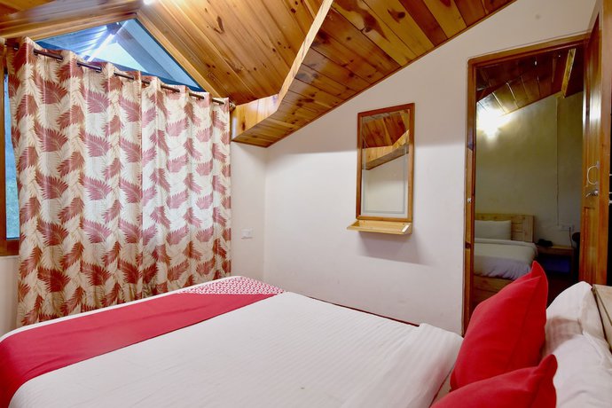 Imagen de la habitación del Hotel OYO 9480 Sun N Snow Resort. Foto 17