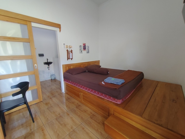 Imagen de la habitación del Hotel OYO 94933 Wisma Cha Tatami Palangkaraya. Foto 2