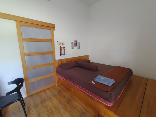 Imagen de la habitación del Hotel OYO 94933 Wisma Cha Tatami Palangkaraya. Foto 3