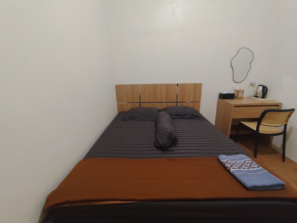 Imagen de la habitación del Hotel OYO 94933 Wisma Cha Tatami Palangkaraya. Foto 4