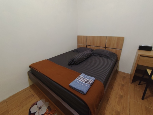 Imagen de la habitación del Hotel OYO 94933 Wisma Cha Tatami Palangkaraya. Foto 5