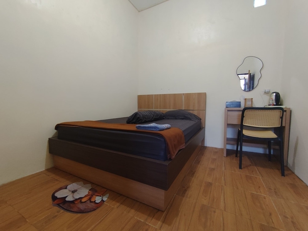 Imagen de la habitación del Hotel OYO 94933 Wisma Cha Tatami Palangkaraya. Foto 6