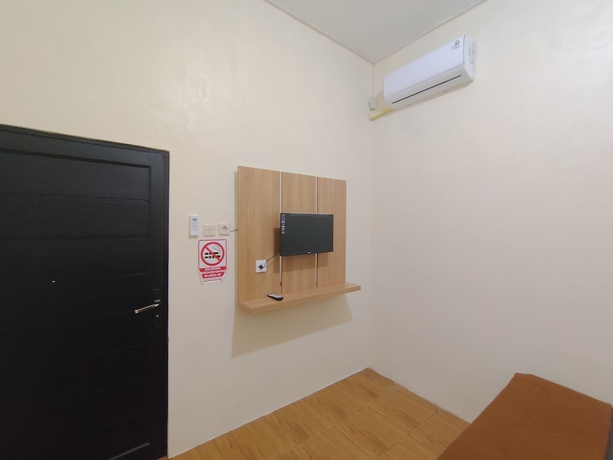 Imagen de la habitación del Hotel OYO 94933 Wisma Cha Tatami Palangkaraya. Foto 7