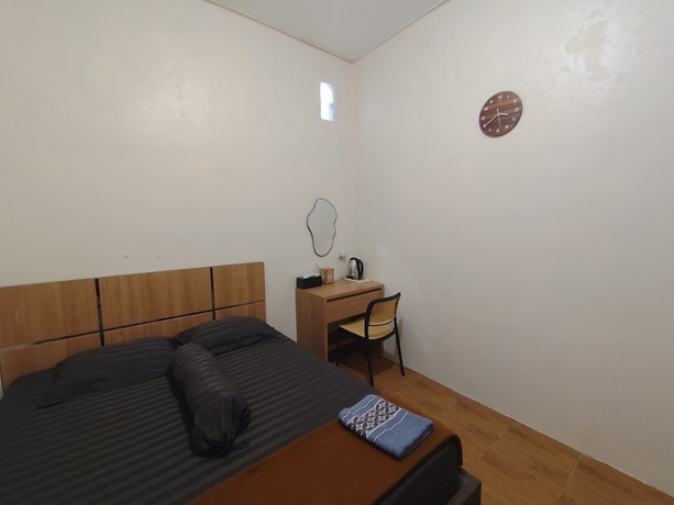Imagen de la habitación del Hotel OYO 94933 Wisma Cha Tatami Palangkaraya. Foto 8
