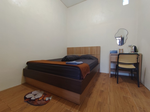 Imagen de la habitación del Hotel OYO 94933 Wisma Cha Tatami Palangkaraya. Foto 10