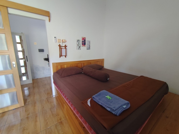 Imagen de la habitación del Hotel OYO 94933 Wisma Cha Tatami Palangkaraya. Foto 13