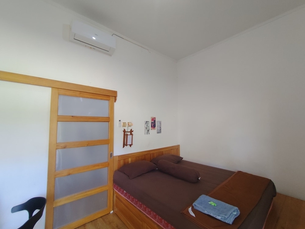 Imagen de la habitación del Hotel OYO 94933 Wisma Cha Tatami Palangkaraya. Foto 14