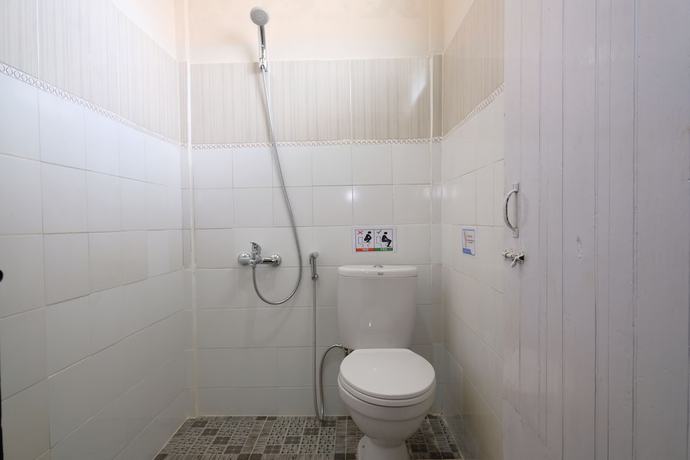 Imagen de la habitación del Hotel OYO 950 Steze Kost Syariah. Foto 5