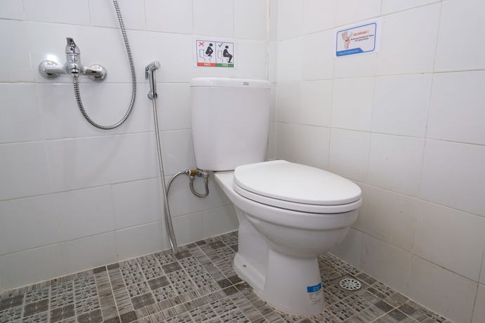 Imagen de la habitación del Hotel OYO 950 Steze Kost Syariah. Foto 6