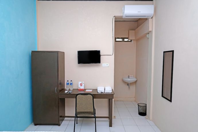 Imagen de la habitación del Hotel OYO 950 Steze Kost Syariah. Foto 7