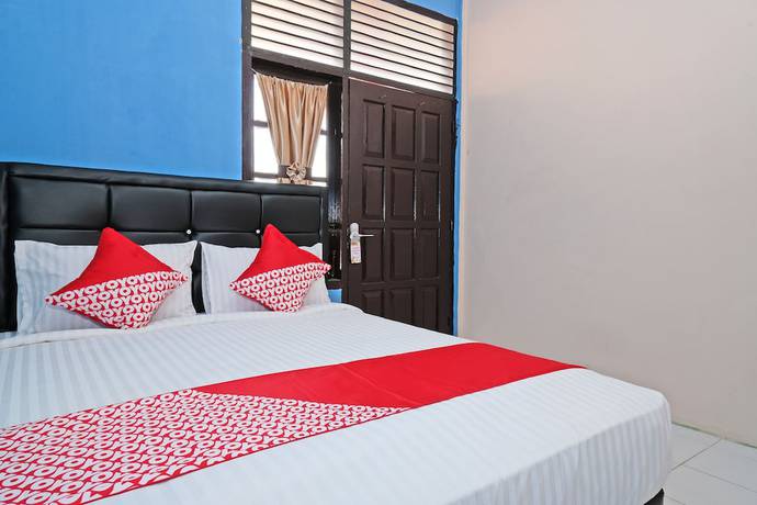 Imagen de la habitación del Hotel OYO 950 Steze Kost Syariah. Foto 8