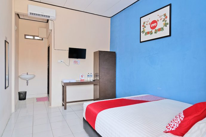 Imagen de la habitación del Hotel OYO 950 Steze Kost Syariah. Foto 9