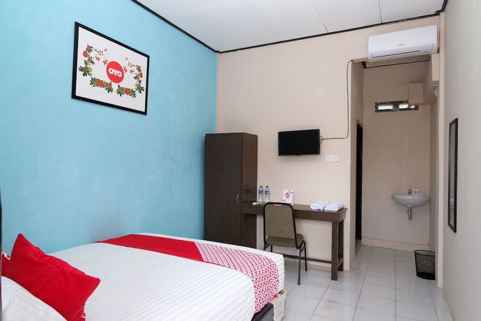 Imagen de la habitación del Hotel OYO 950 Steze Kost Syariah. Foto 12
