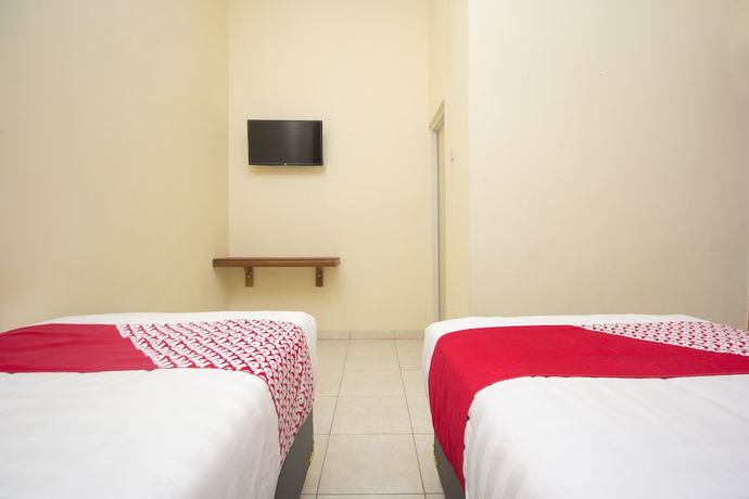 Imagen de la habitación del Hotel OYO 952 Annisa Syariah Guest House. Foto 9