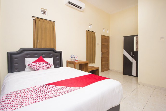 Imagen de la habitación del Hotel OYO 952 Annisa Syariah Guest House. Foto 11