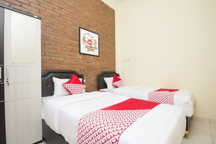 Imagen de la habitación del Hotel OYO 952 Annisa Syariah Guest House. Foto 13