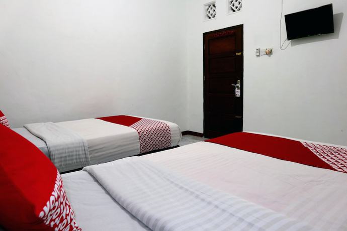 Imagen de la habitación del Hotel OYO 956 Penginapan Eby. Foto 2