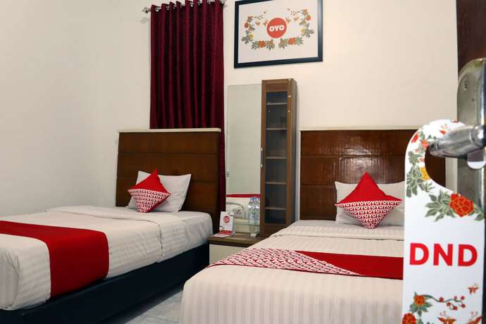 Imagen de la habitación del Hotel OYO 956 Penginapan Eby. Foto 3