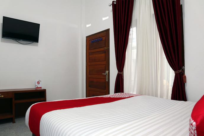 Imagen de la habitación del Hotel OYO 956 Penginapan Eby. Foto 7