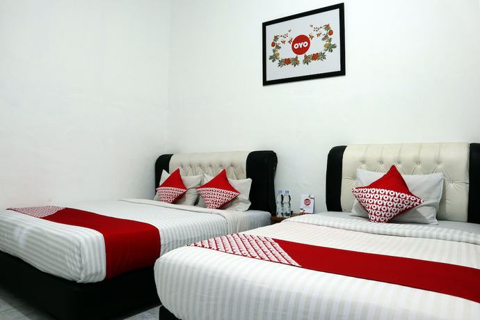Imagen de la habitación del Hotel OYO 956 Penginapan Eby. Foto 9