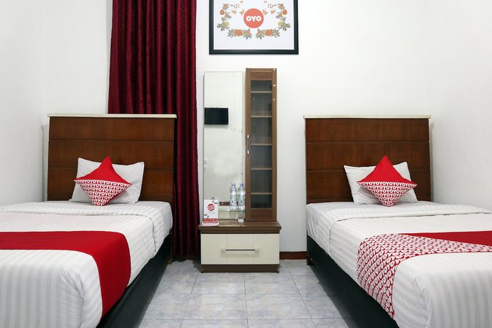 Imagen de la habitación del Hotel OYO 956 Penginapan Eby. Foto 11