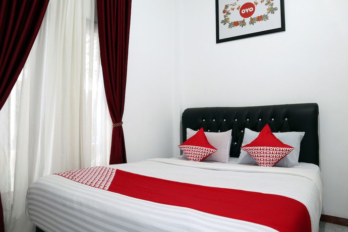Imagen de la habitación del Hotel OYO 956 Penginapan Eby. Foto 12