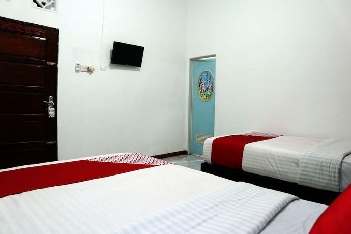 Imagen de la habitación del Hotel OYO 956 Penginapan Eby. Foto 13