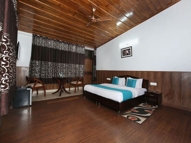 Imagen de la habitación del Hotel OYO 9660 Blossom Resort. Foto 11