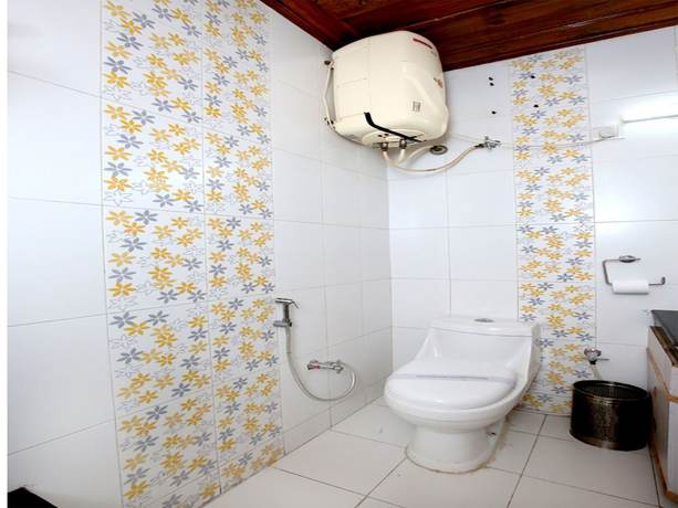 Imagen de la habitación del Hotel OYO 9660 Blossom Resort. Foto 12