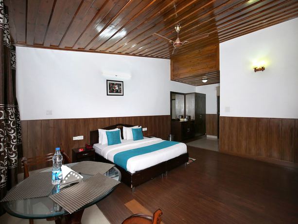 Imagen de la habitación del Hotel OYO 9660 Blossom Resort. Foto 13