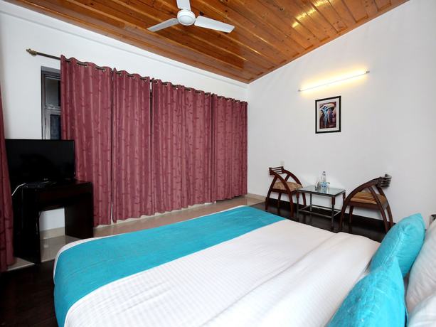 Imagen de la habitación del Hotel OYO 9660 Blossom Resort. Foto 14