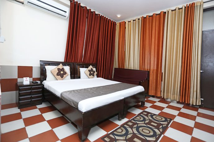 Imagen de la habitación del Hotel OYO 9705 Grand Empire Expressway. Foto 4
