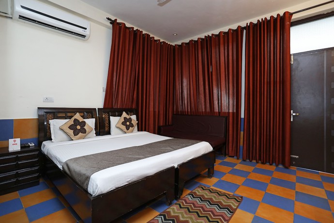 Imagen de la habitación del Hotel OYO 9705 Grand Empire Expressway. Foto 5