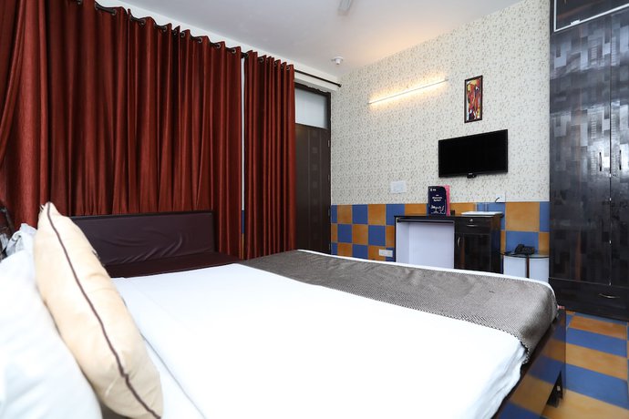 Imagen de la habitación del Hotel OYO 9705 Grand Empire Expressway. Foto 6