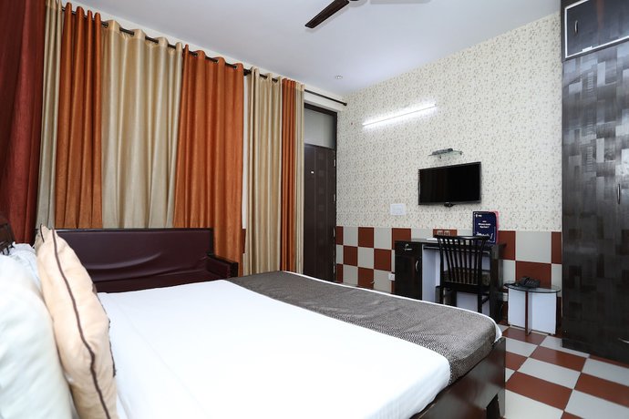Imagen de la habitación del Hotel OYO 9705 Grand Empire Expressway. Foto 8