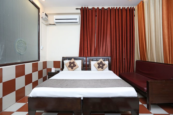 Imagen de la habitación del Hotel OYO 9705 Grand Empire Expressway. Foto 9