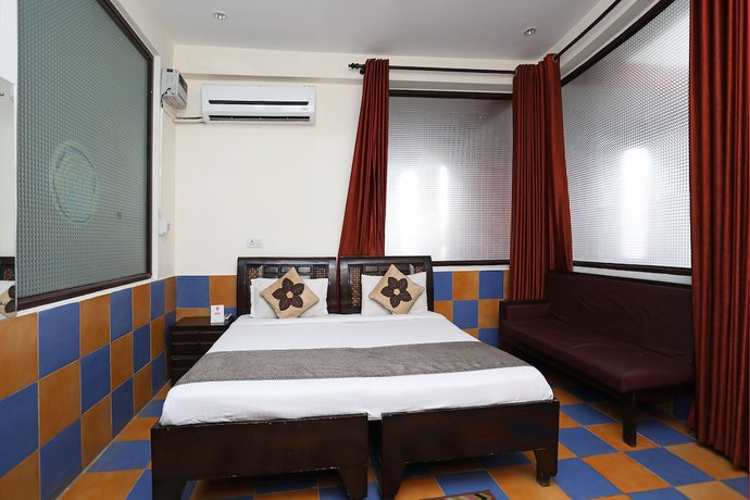 Imagen de la habitación del Hotel OYO 9705 Grand Empire Expressway. Foto 10