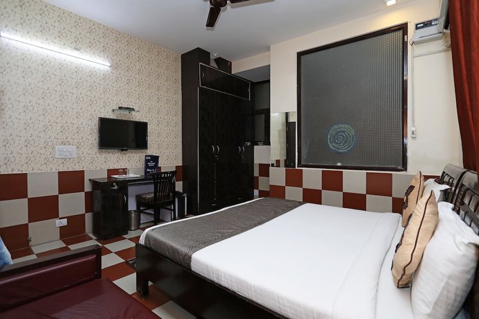 Imagen de la habitación del Hotel OYO 9705 Grand Empire Expressway. Foto 13